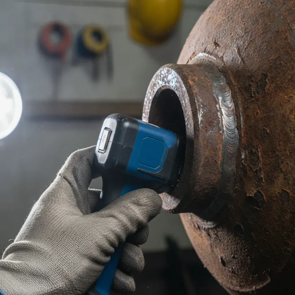 Close-up of laser scanner on corroded tank weld for vessel modeling in Calgary